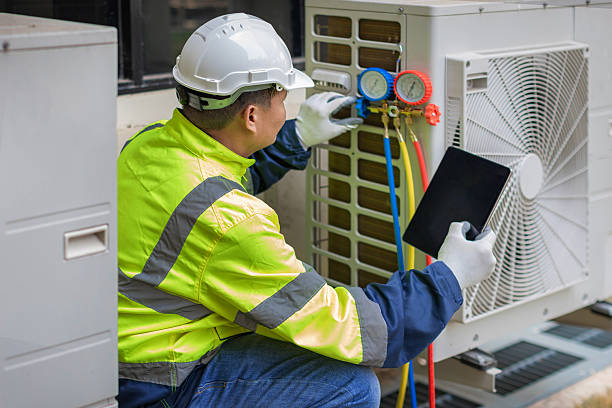 Professional Heat Pump Repair technician working in Greendell, NJ